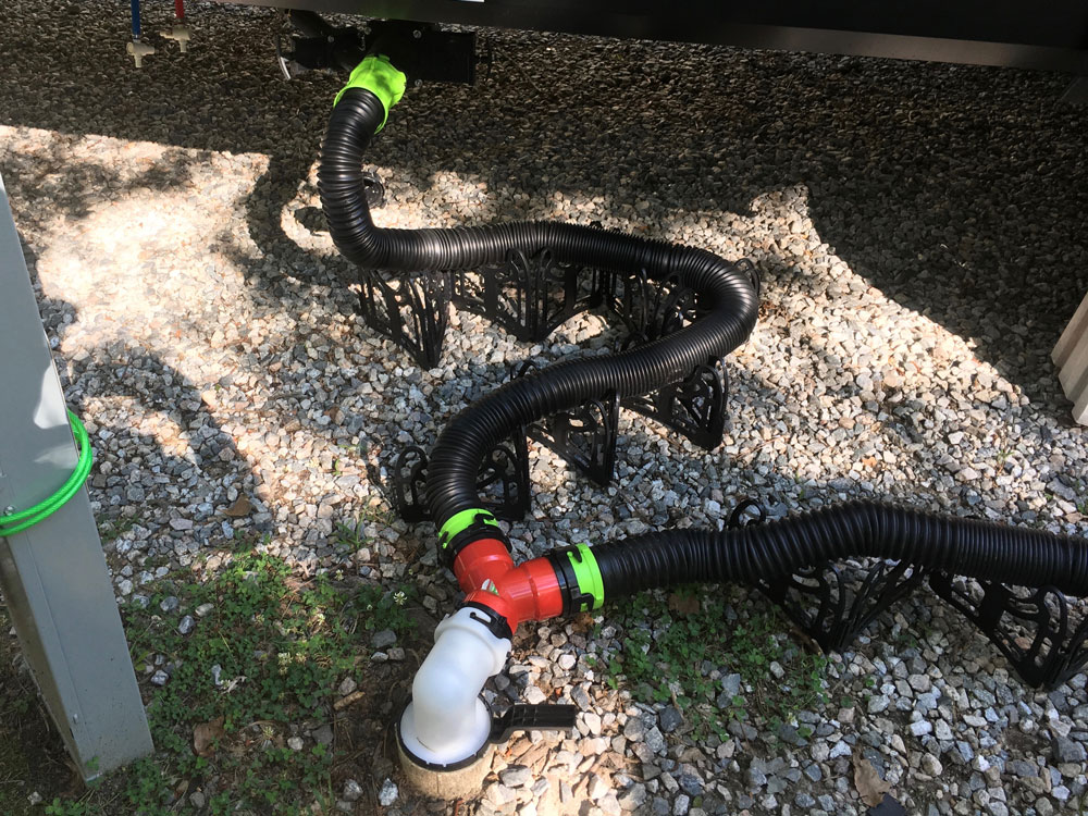 Two Thetford Titan RV Sewer Hoses Connected to Valterra Wye Showing Need for Shorter Sewer Hose