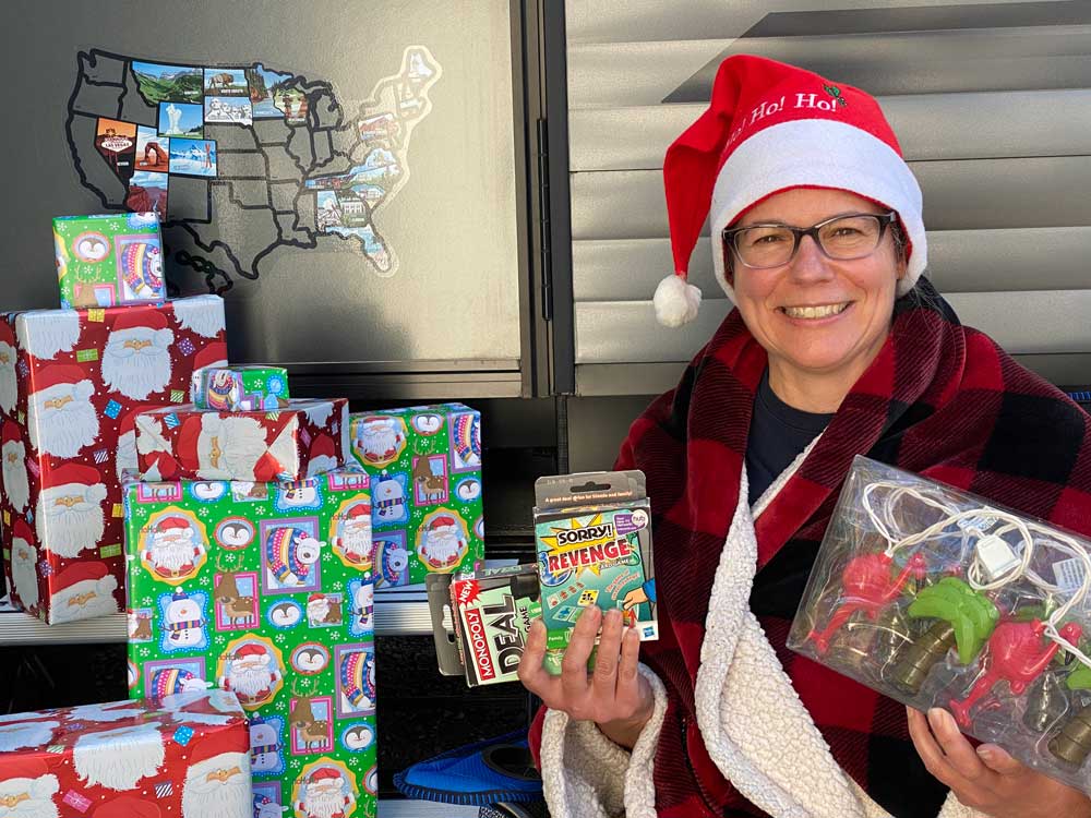 Woman Ready to Give RV Camper Gifts