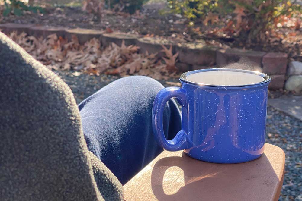 Enjoying a Mug of  Camping Coffee on a Cool Day