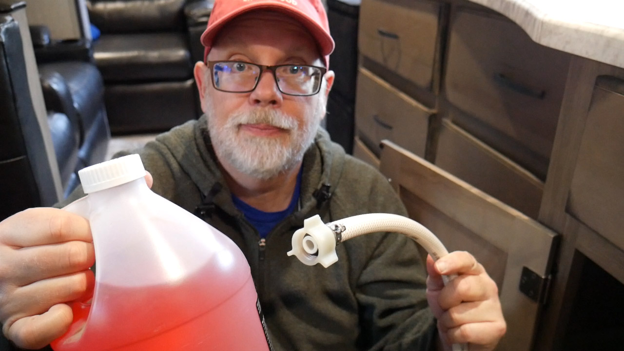 Draw Antifreeze Into the System Using The Winterization Hose