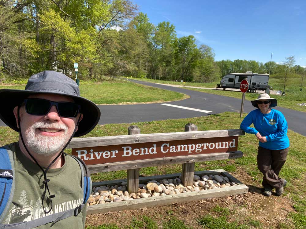 Powhatan State Park Couple Standing By The River Bend Campground Sign