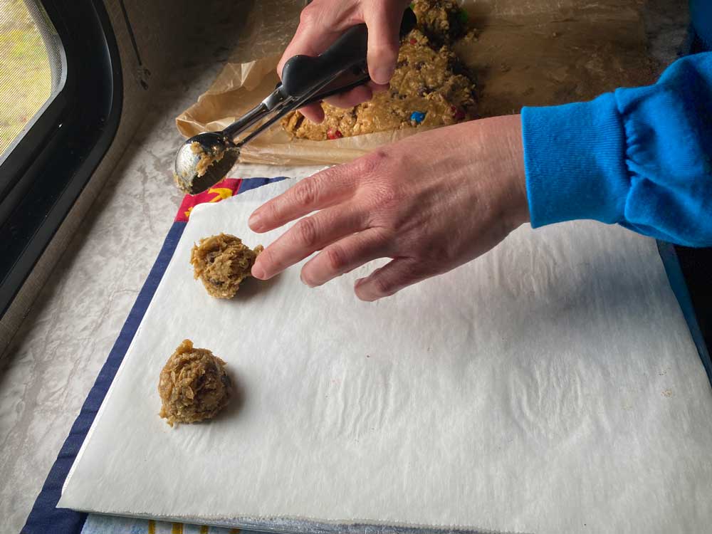 Scoop Monster Cookie Dough Onto a Baking Sheet With Parchment Paper