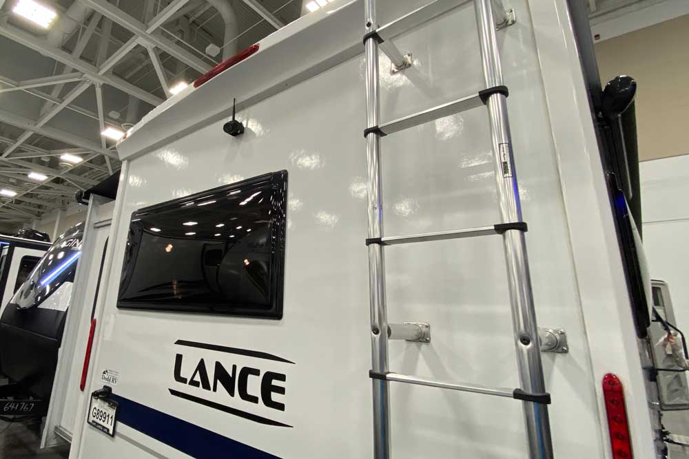 Ladder on the Back of the Lance 2465 Travel Trailer