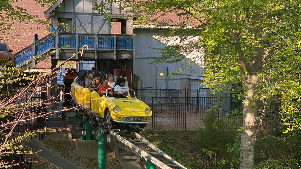 Cars coming out of the station on the Verbolten roller coaster at Busch Gardens Williamsburg