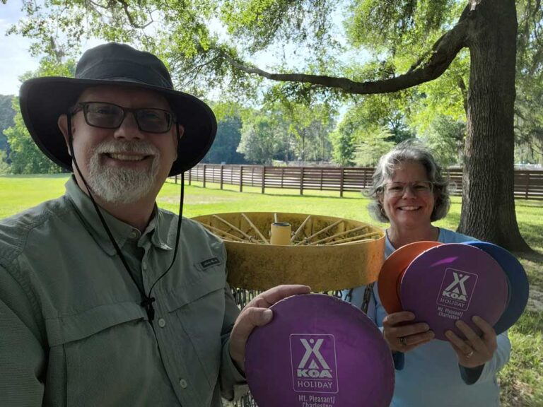 Erling and Judy playing disc golf at Mount Pleasant Charleston KOA
