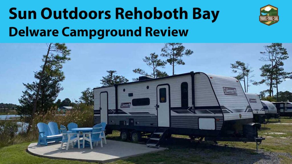 Travel trailer in deluxe campsite at Sun Outdoors Rehoboth Bay Campground YouTube video thumbnail