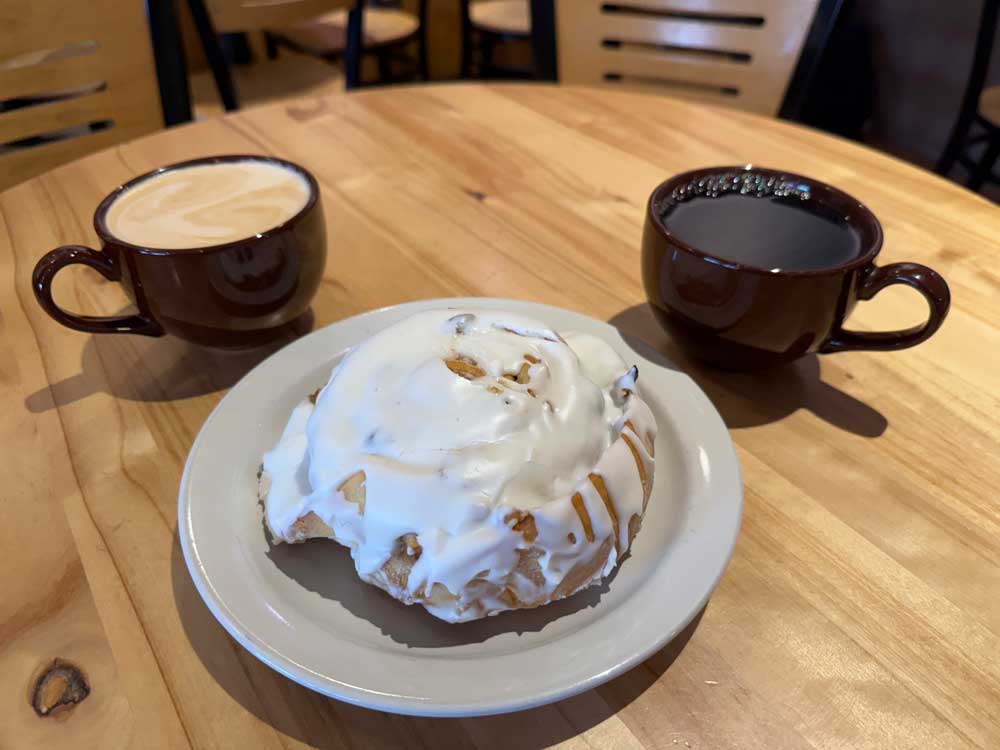 cinnamon roll and coffee at Alaska Coffee Roasting