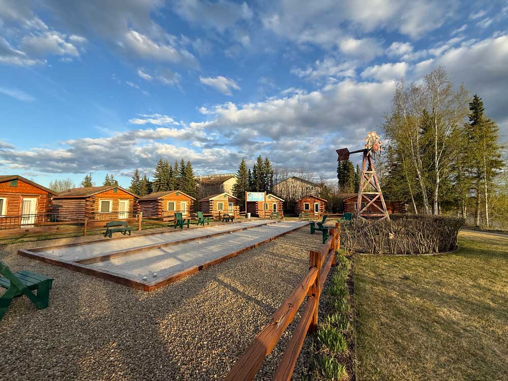 Log cabins and bocce ball court at Pike's Waterfront Lodge Fairbanks Alaska