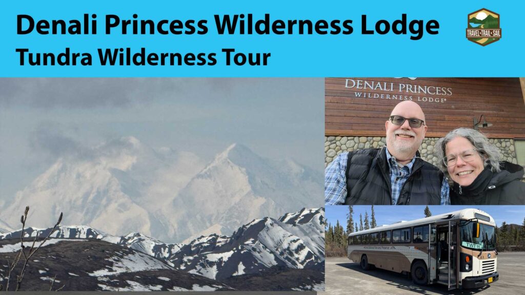 Erling and Judy pictures with a mountain and tour bus for a YouTube video about the Denali Princess Wilderness Lodge