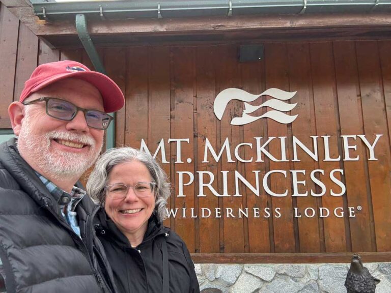 Erling and Judy by the McKinley Princess Wilderness Lodge sign