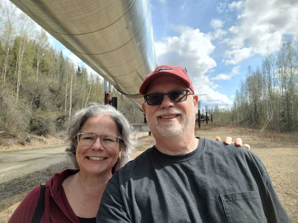 Erling and Judy by the Trans-Alaska Pipeline