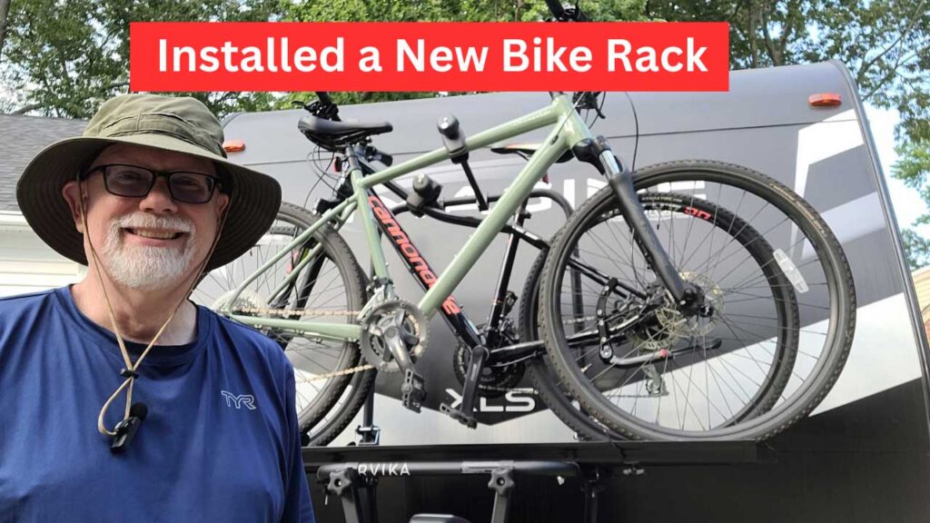 Erling next to bikes on Arvika rack for bike rack installation YouTube video