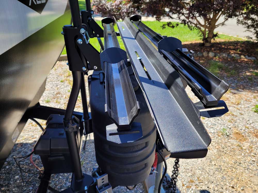 Arvika rack side view showing two bicycle trays and the optional loading ramp