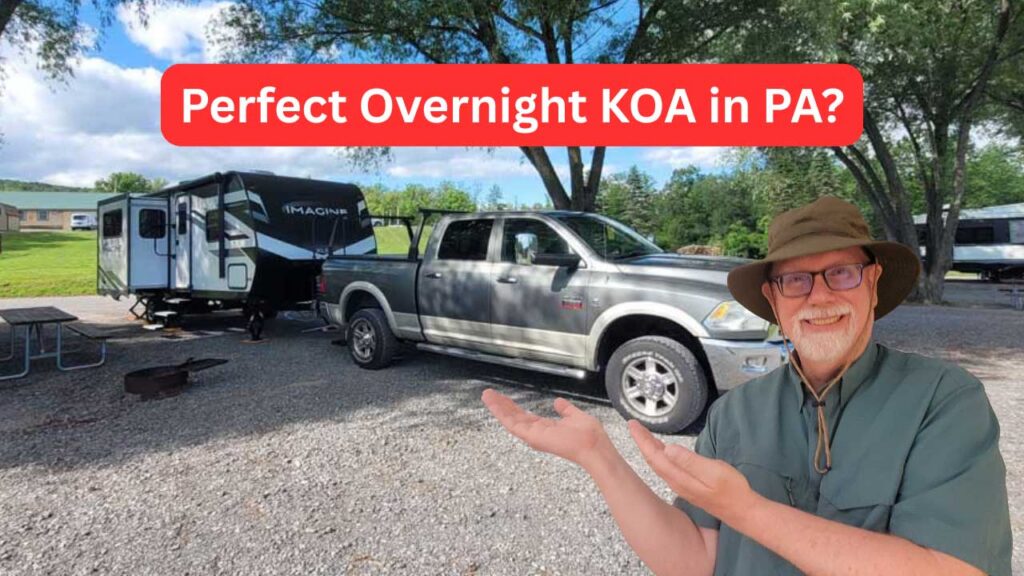 Erling next to a camper at the Williamsport KOA