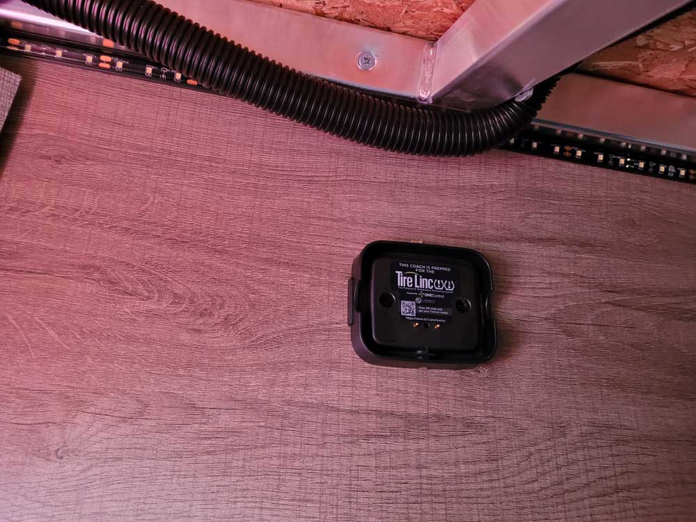 Tire Linc repeater base pre-installed in storage bay