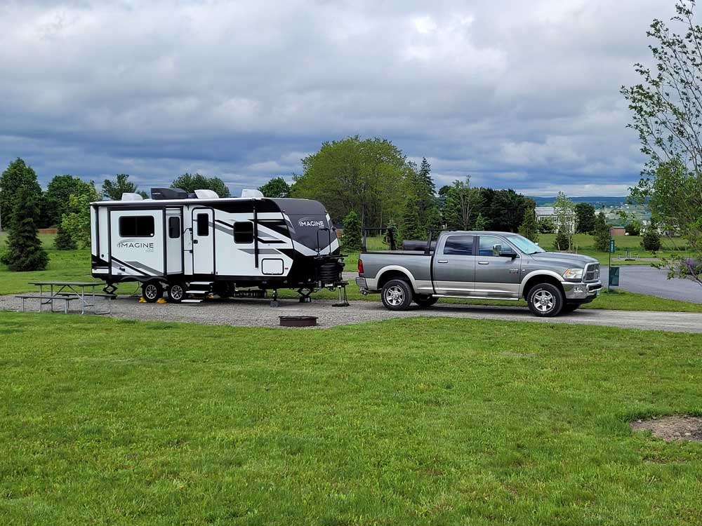 Pickup and camper in site at Finger Lakes RV Resort