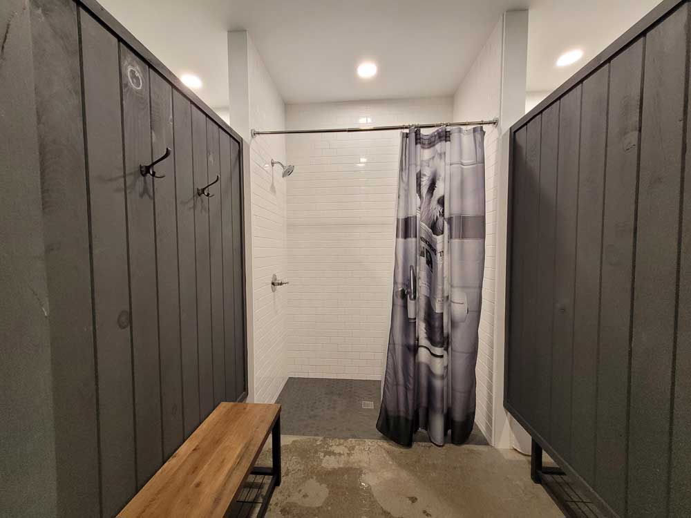 Clean bathhouse and spacious shower area at Finger Lakes RV Resort