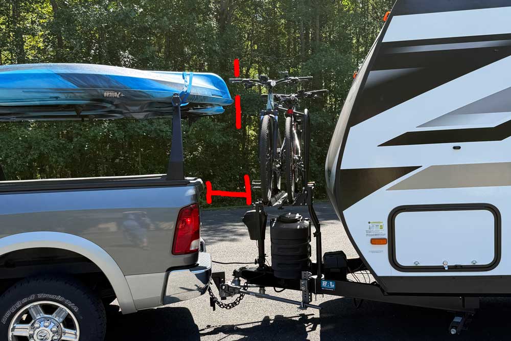Space between truck, kayak, and arvika bike rack